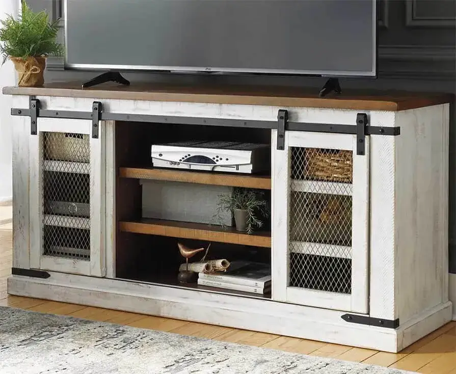 Rustic TV stand with sliding barn doors.