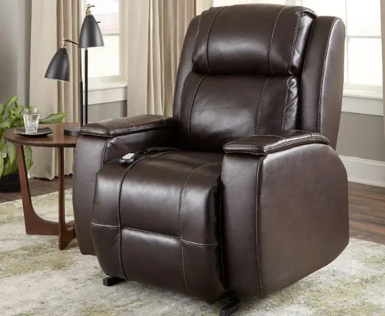 Brown leather recliner chair in a cozy living room.
